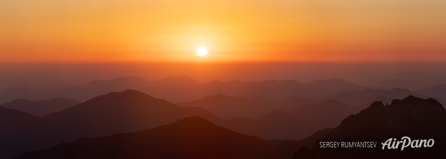 Sunset over Huangshan mountains